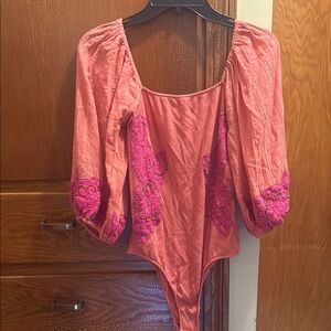 Elegant Free People “intimately” Pink Bodysuit with Floral Accents
